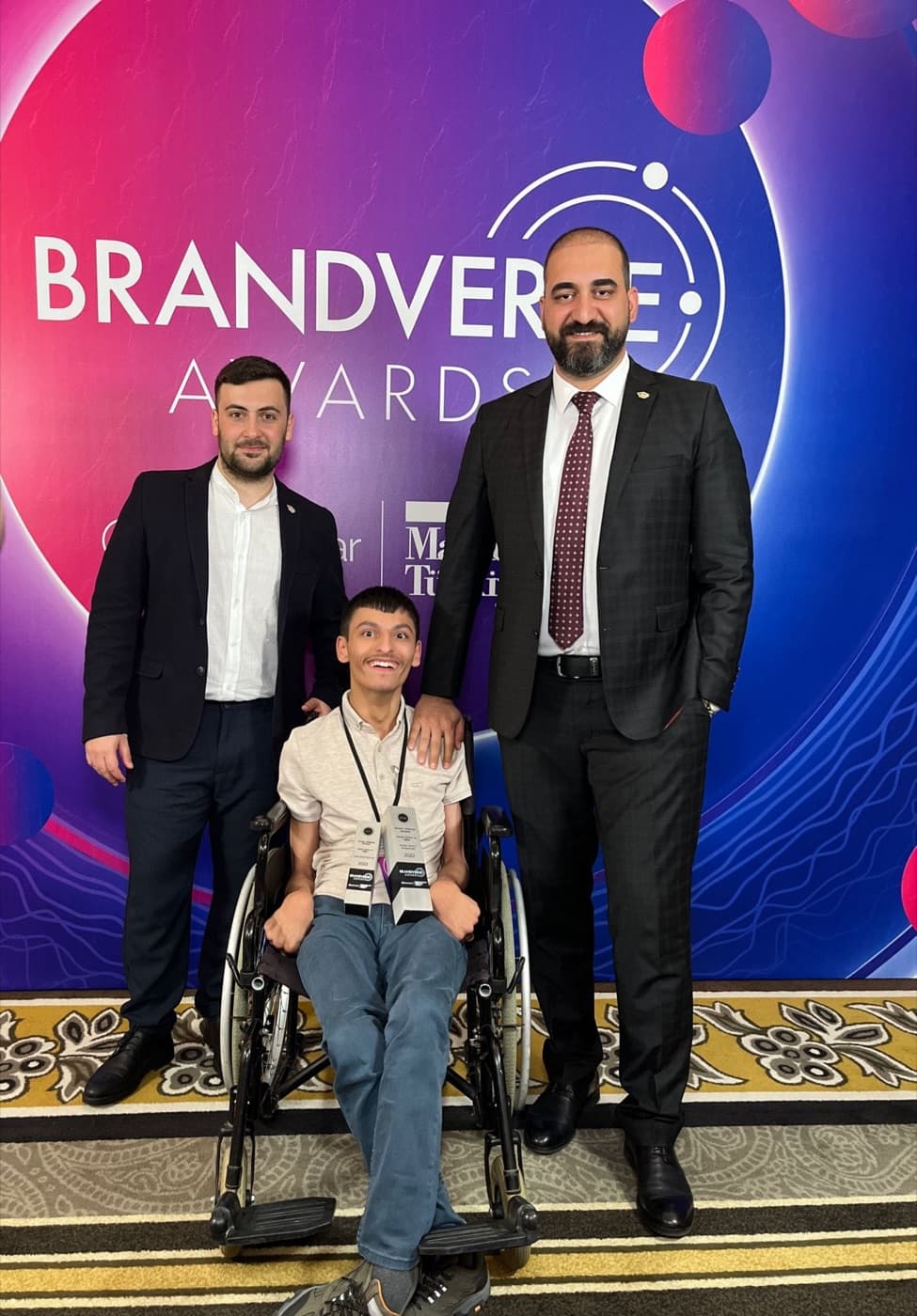 Ozgur Safak Okmek with teammates at the Brandverse Awards ceremony